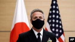 Adm. Philip Davidson, commander of the U.S. Indo-Pacific Command, waits for the arrival of Japan's Prime Minister Yoshihide Suga for a meeting at the prime minister's office, Oct. 22, 2020, in Tokyo.