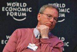Former CEO of Google, Eric Schmidt, listens during a session at the World Economic Forum in Davos, Switzerland, Jan. 28, 2011.