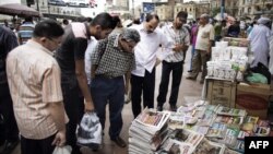 M23 rebels guard weapons given to them by the government&#39;s army, Goma, DRC, November 21, 2012. 