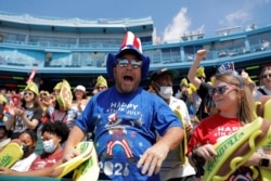 People celebrate Independence Day at the Nathan's Famous Fourth of July Hot Dog-Eating Contest held at Maimonides Park in Brooklyn, New York City, July 4, 2021.