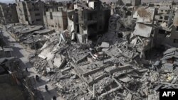 A general view shows several destroyed buildings in Douma, in the rebel enclave of eastern Ghouta on the outskirts of Damascus, March 5, 2018.