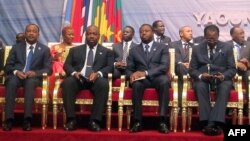 (L-R) Presidents Mahamadou Issoufou of Niger, Ali Bongo Ondimba of Gabon, Faure Gnassingbe of Togo and Idriss Deby Itno of Chad attend the opening in Yaounde of a meeting on maritime security in the Gulf of Guinea, June 24, 2013.