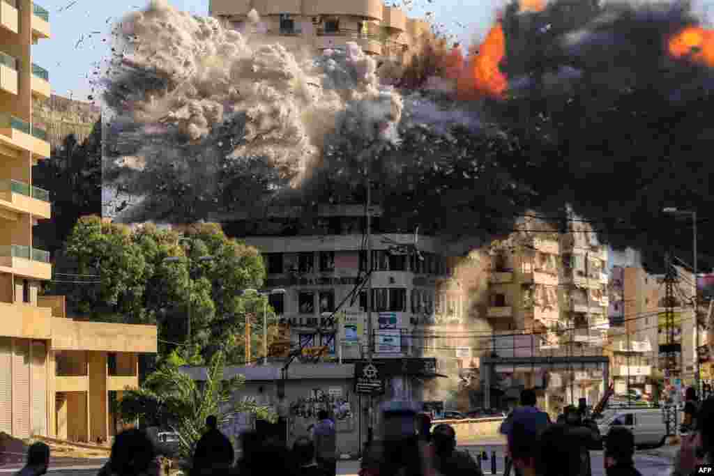 Fire and smoke erupt from a building just after an Israeli airstrike in Beirut&#39;s southern Shayah neighborhood, amid the ongoing war between Israel and Hezbollah.&nbsp;&nbsp;(Photo by AFP)