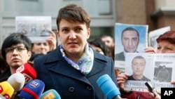 Ukrainian lawmaker Nadiya Savchenko speaks to the media in Kyiv, Feb. 28, 2017. 