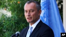 FILE - In a Monday, Sept. 25, 2017, photo, United Nations Special Coordinator for the Middle East Peace Process Nickolay Mladenov, attends a press conference at the UNSCO offices in Gaza City.