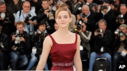 Actress Emma Watson poses for photographers during a photo call for the film The Bling Ring at the 66th international film festival, in Cannes, southern France, May 16, 2013.