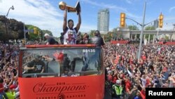 Parade en l'honneur des Raptors, nouveaux champions de la NBA, Toronto, Canada, le 17 juin 2019. 
