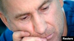 Anzor Tsarnaev, who calls himself father of Dzhokhar and Tamerlan Tsarnaev, the two suspects in the Boston Marathon bombings, gives an interview in Makhachkala in this video image from footage via Reuters TV, April 19, 2013. 