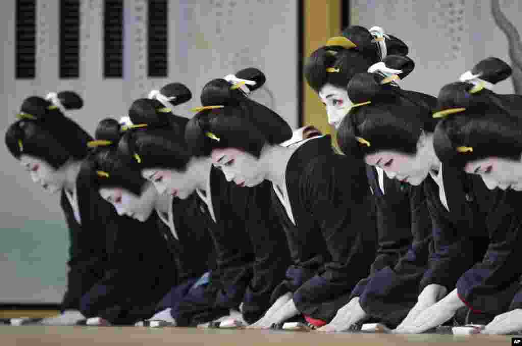 Japanese traditional female entertainers, or geisha, from Shimbashi area rehearse for &quot;Azumaodori&quot; at Shimbashi Enbujo Theater in Tokyo.