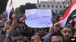 埃及民众1月25日聚集在开罗的解放广场纪念起义一周年