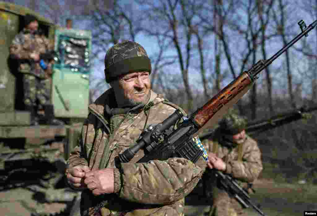 Members of the Ukrainian armed forces are seen near Artemivsk, eastern Ukraine, Feb. 23, 2015.