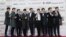 South Korean K-Pop group EXO poses prior to the K-POP Awards 2014 in Seoul, South Korea, Wednesday, Jan. 28, 2015. (AP Photo/Ahn Young-joon)