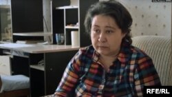 FILE - Journalist Natalya Zubkova said an attacker pressed her face against the snow and threatened that she and her daughters would face further violence if "you open your mouth again."