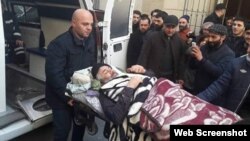 Əbülfəz Bünyadov məhkəmdən aparılarkən (Arxiv foto)