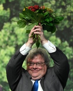 FILE - Reinhard Buetikofer attends a congress of the German Green party in Bielefeld, western Germany, Nov. 16, 2019.