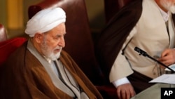 Newly elected chairman of the Iran's Assembly of Experts Ayatollah Mohammad Yazdi sits in a biannual meeting of the assembly in Tehran, Iran, Tuesday, March 10, 2015.