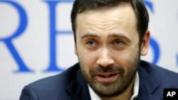 FILE - Russia's parliament has voted to strip lawmaker Ilya Ponomaryov of immunity from prosecution. Shown in 2011, he was the only one of the Duma's 450 members to oppose Russia's annexation of Crimea.