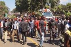 Protesters took to the streets to rally against the May presidential election results throughout the court hearing in Malawi. (Lameck Masina/VOA)