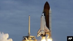 The space shuttle Atlantis lifts off from the Kennedy Space Center, July 8, 2011, in Cape Canaveral, Florida