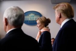 President Donald Trump and Vice President Mike Pence listen as Dr. Deborah Birx, White House coronavirus response coordinator, speaks about the coronavirus in the James Brady Press Briefing Room of the White House, April 23, 2020.