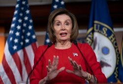 FILE - Speaker of the House Nancy Pelosi talks to reporters on Capitol Hill in Washington, Nov. 14, 2019.