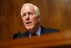 FILE - Sen. John Cornyn, R-Texas, speaks during a hearing about border security, May 8, 2019, on Capitol Hill in Washington.