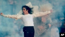 FILE - Michael Jackson performs during the halftime show at the Super Bowl XXVII in Pasadena, California, Jan. 31, 1993.