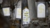 Graves that were desecrated with swastikas are seen at the Jewish cemetery in Quatzenheim, near Strasbourg, France, Feb. 19, 2019.