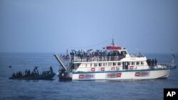 FILE - Israeli soldiers raid a ship as the navy intercepts a Gaza-bound aid flotilla in the Mediterranean Sea on May 31, 2010.