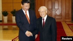 11月5日，中国国家主席习近平与越南共产党总书记阮富仲在越南河内会晤。