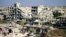 A picture taken on June 1, 2018, shows a view of destroyed buildings in a rebel-held area in the southern Syrian city of Daraa.