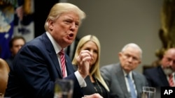 President Donald Trump speaks during a meeting with state and local officials to discuss school safety, in the Roosevelt Room of the White House, Thursday, Feb. 22, 2018, in Washington. (AP Photo/Evan Vucci)