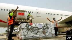 A shipment of COVID-19 vaccines distributed by the COVAX Facility arrives in Abidjan, Ivory Coast, Feb. 25, 2021. Ivory Coast is the second country in the world after Ghana to receive vaccines acquired through the U.N.-backed COVAX initiative.