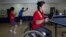FILE - Disabled North Korean table tennis players practice at the Taedonggong Cultural Center for the Disabled in Pyongyang, North Korea.