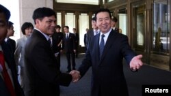 International Criminal Police Organization (Interpol) says delegates at its 85th General Assembly in Bali, Indonesia, Nov. 10, 2016, elected China's Vice Public Security Minister, Meng Hongwei (R), as president.