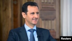 Presiden Suriah Bashar al-Assad dalam wawancara dengan stasiun TV al-Manar, Selasa (25/8).