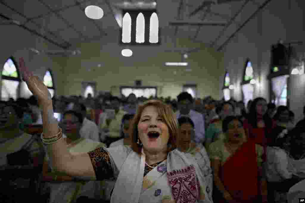 An Indian Christian prays during Easter Mass at a Church in Gauhati, April 5, 2015.
