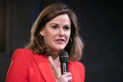 Campbell Brown, head of Facebook's news partnerships team, introduces Facebook CEO Mark Zuckerberg at the Paley Center, Oct. 25, 2019 in New York.
