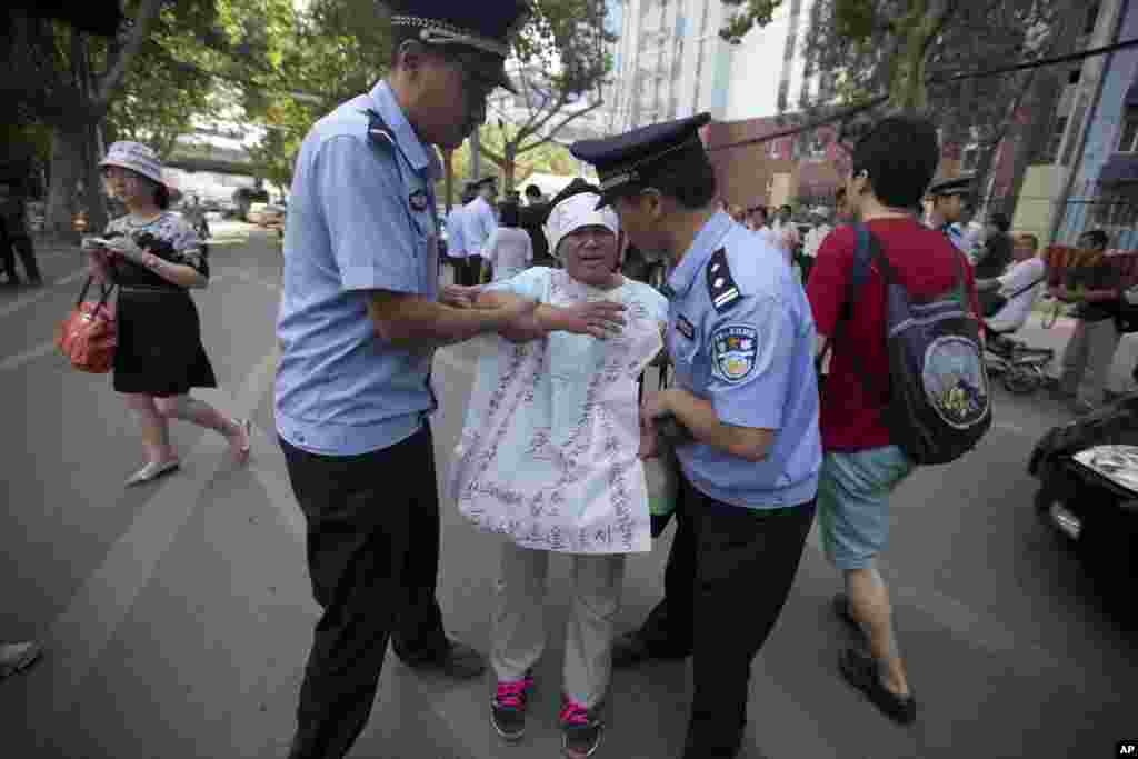 North Korea's gold medalist Kim Un Hyang cries during the medal ceremony for the women's beam final of the artistic gymnastics competition at the Namdong Gymnasium Club during the 17th Asian Games in Incheon, South Korea.