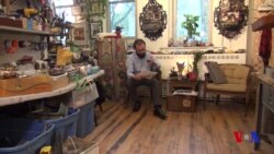 Suriya urushi dahshatlari - chamadon ichidagi san'at asarlarida