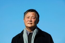 Former Chinese political prisoner and leading human rights activist Wei Jingsheng listens to statements by U.S. Congressmen and human rights groups in front of the U.S. Capitol Building, Jan. 14, 2010.