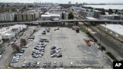 An aerial view shows a parking lot that was once the Shellmound village site in Berkeley, Calif., March 12, 2024.