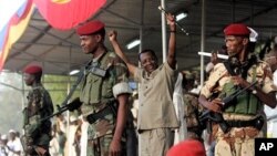 Rais wa Chad Idriss Deby akiwasalimia wafuasi wake wa Patriotic Salvation Movement wakati wa mkutano katika mji mkuu N'djamena