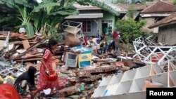 រូបឯកសារ៖ ការខូចខាតបង្កឡើងដោយរលកយក្សស៊ូណាមិនៅប្រទេសឥណ្ឌូនេស៊ីកន្លងទៅ។ 