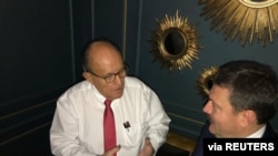 Ukrainian lawmaker Andriy Derkach attends a meeting with U.S. President Donald Trump's personal lawyer Rudolph Giuliani in Kyiv, in this undated picture obtained from social media. (Courtesy of Andriy Derkach)