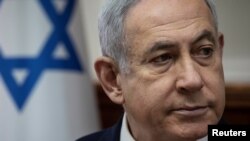 Israeli Prime Minister Benjamin Netanyahu attends the weekly cabinet meeting at the Prime Minister's office in Jerusalem, Jan. 12, 2020. 