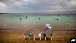 Scientists say the surface of the Dead Sea is dropping by about one meter a year. Below average rainfall is causing the sea to lose more water.
