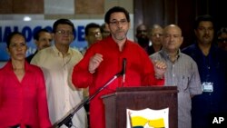 FARC Commander Pastor Alape talks to reporters in Havana about the suspension of peace talks following the capture of a general in Colombia, Nov. 18, 2014. 