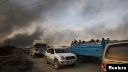 Evakuacija civila iz gradića Ras al Ain na severu Sirije usled ofanzive turske vojske (Foto: Reuters/Rodi Said)