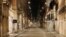 An empty Via del Corso is seen following the imposition of a curfew from 10 p.m. to 5 a.m., as part of tougher measures to tackle the spread of the coronavirus disease (COVID-19), in Rome, Nov. 7, 2020.